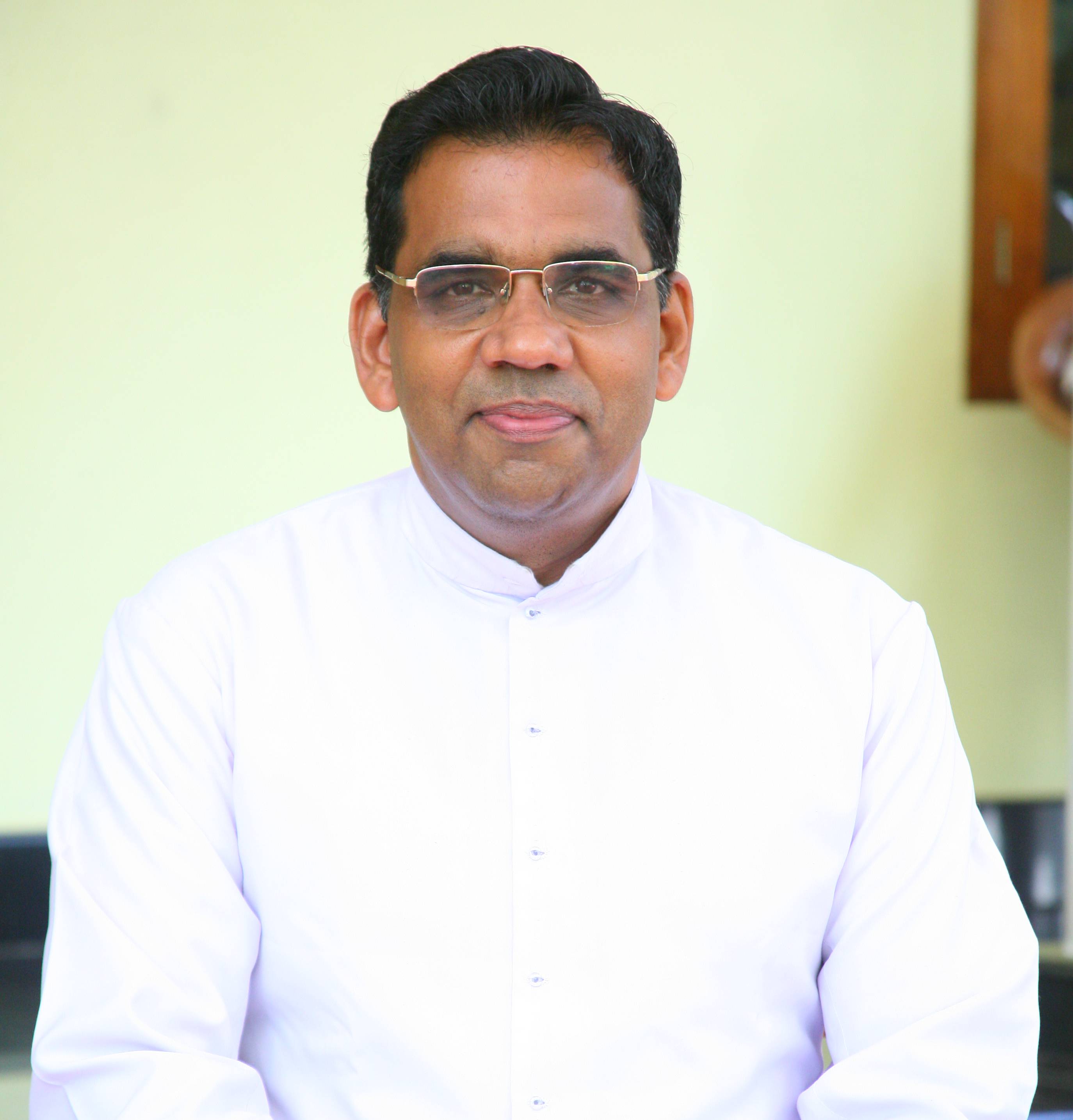 Rev. Fr. Bijoy Jacob, Director NCE